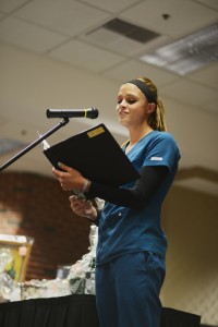 Lindsey works at Mercy Medical Center and came down in the middle of her work day to perform for guests of the Tea in the Hallagan Education Center. 